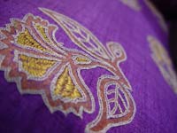 Ahir embroidered 'Thistle flower' on purple khadi silk
